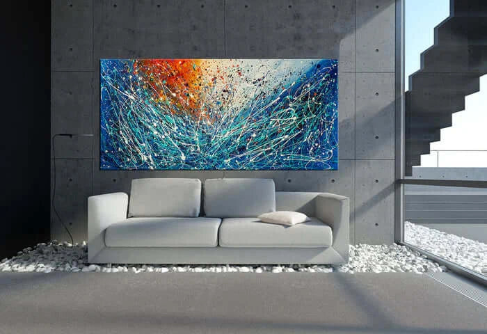 Geometric abstract art in modern living room showcasing vibrant colors and dynamic shapes on canvas.