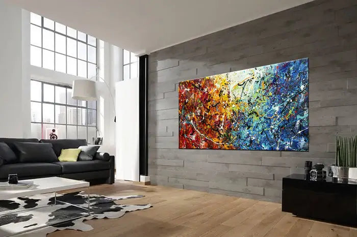Abstract Jackson Pollock | Handmade drip painting on canvas in modern living room with colorful design.