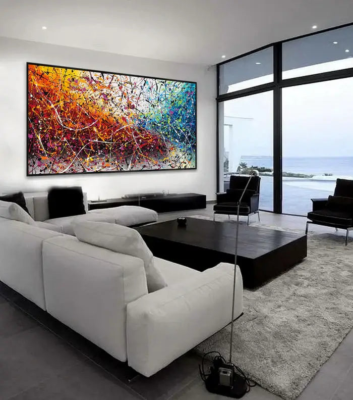 Painting Jackson Pollock Multiple Size displayed in a modern living room with artistic decor and a scenic view.