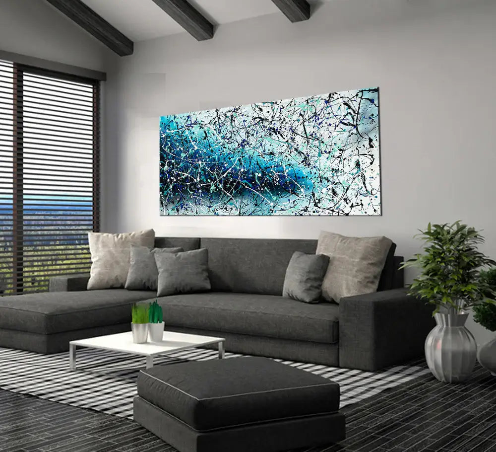 Painting Jackson Pollock Art displayed in a modern living room setting, showcasing vibrant colors and abstract expressionism.