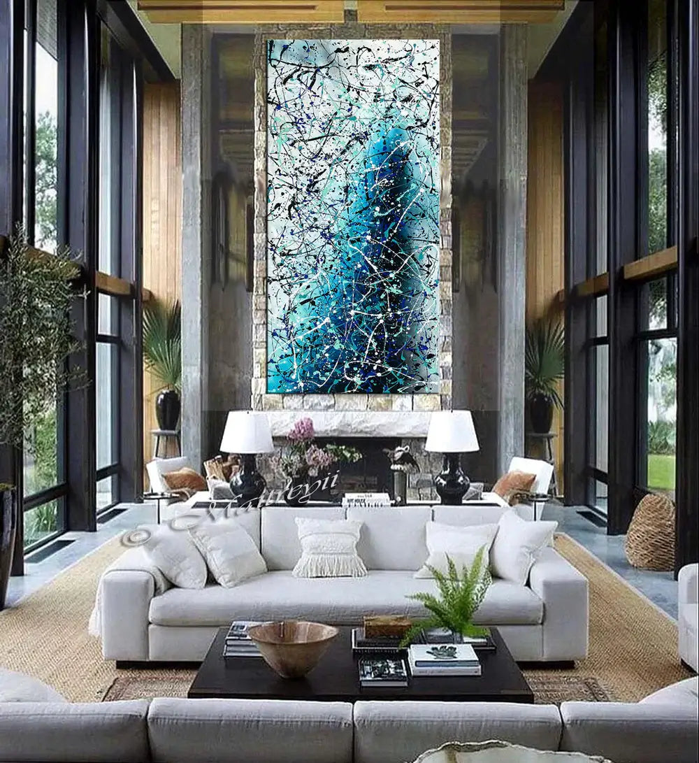 Painting Jackson Pollock Art in a modern living room showcasing vibrant abstract drip art on a feature wall.