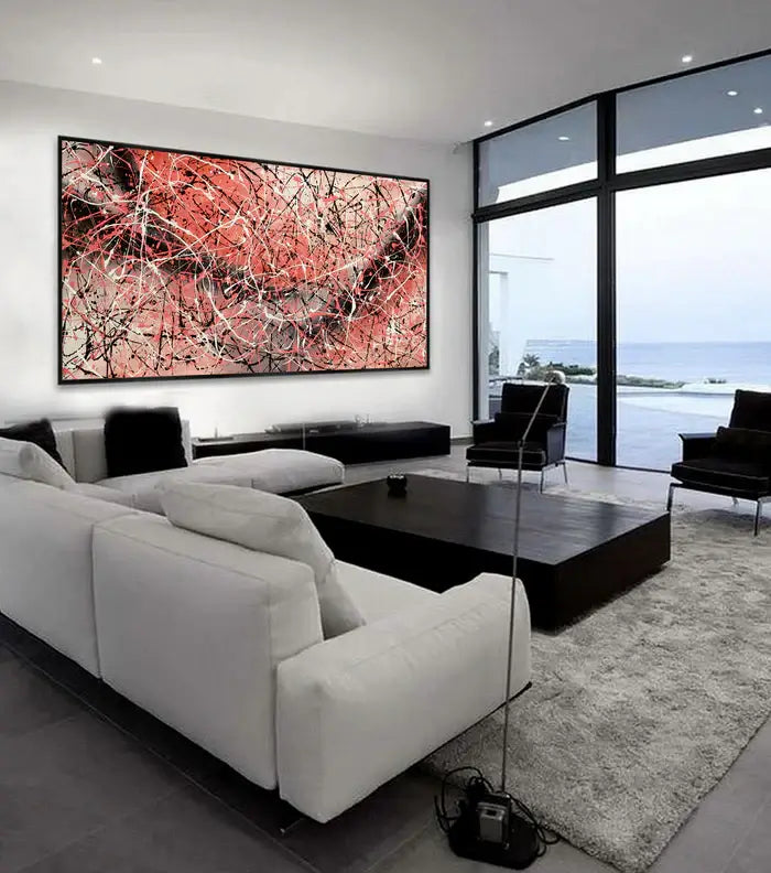 Jackson Pollock Painting displayed in a modern living room with large windows and sea views.