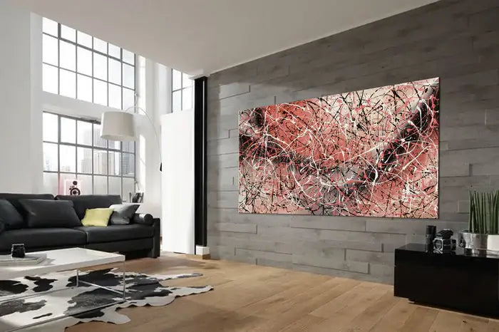 Jackson Pollock Painting displayed in a modern living room, showcasing handmade abstract drip art in vibrant colors.