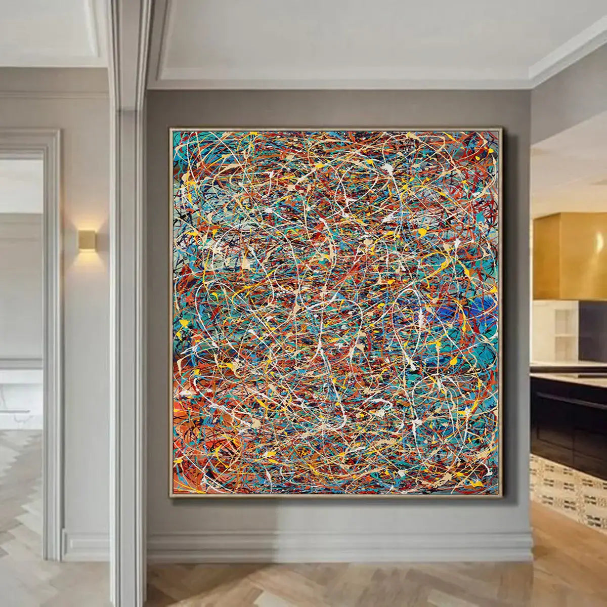 Modern splatter art painting displayed in a stylish interior, showcasing vibrant colors and dynamic textures.