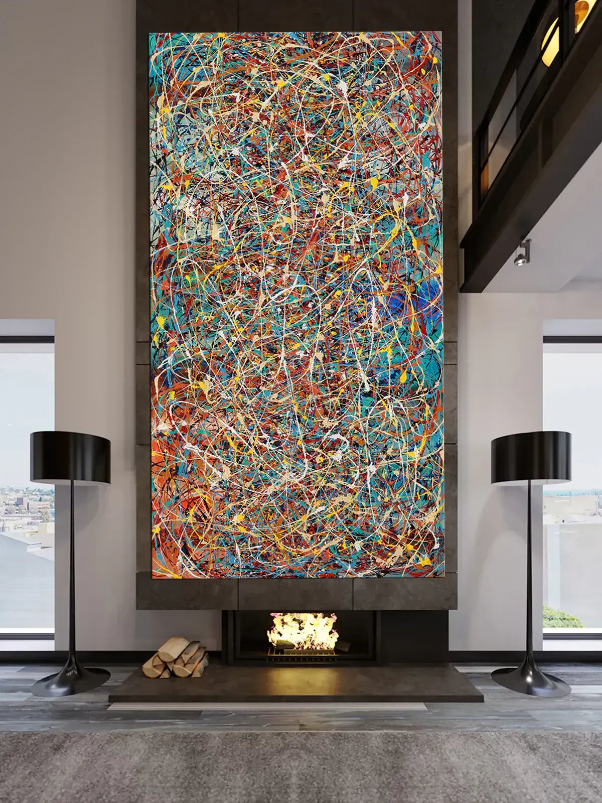 Colorful modern splatter art painting displayed in a stylish living room with a fireplace.