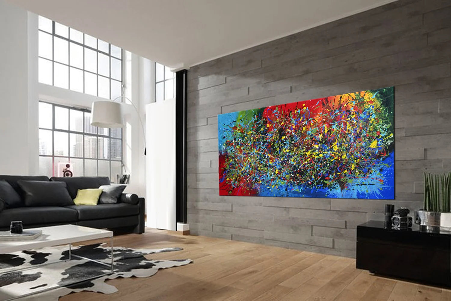 Original Pollock Style Artwork displayed in a modern living room with vibrant colors and abstract expressionism.