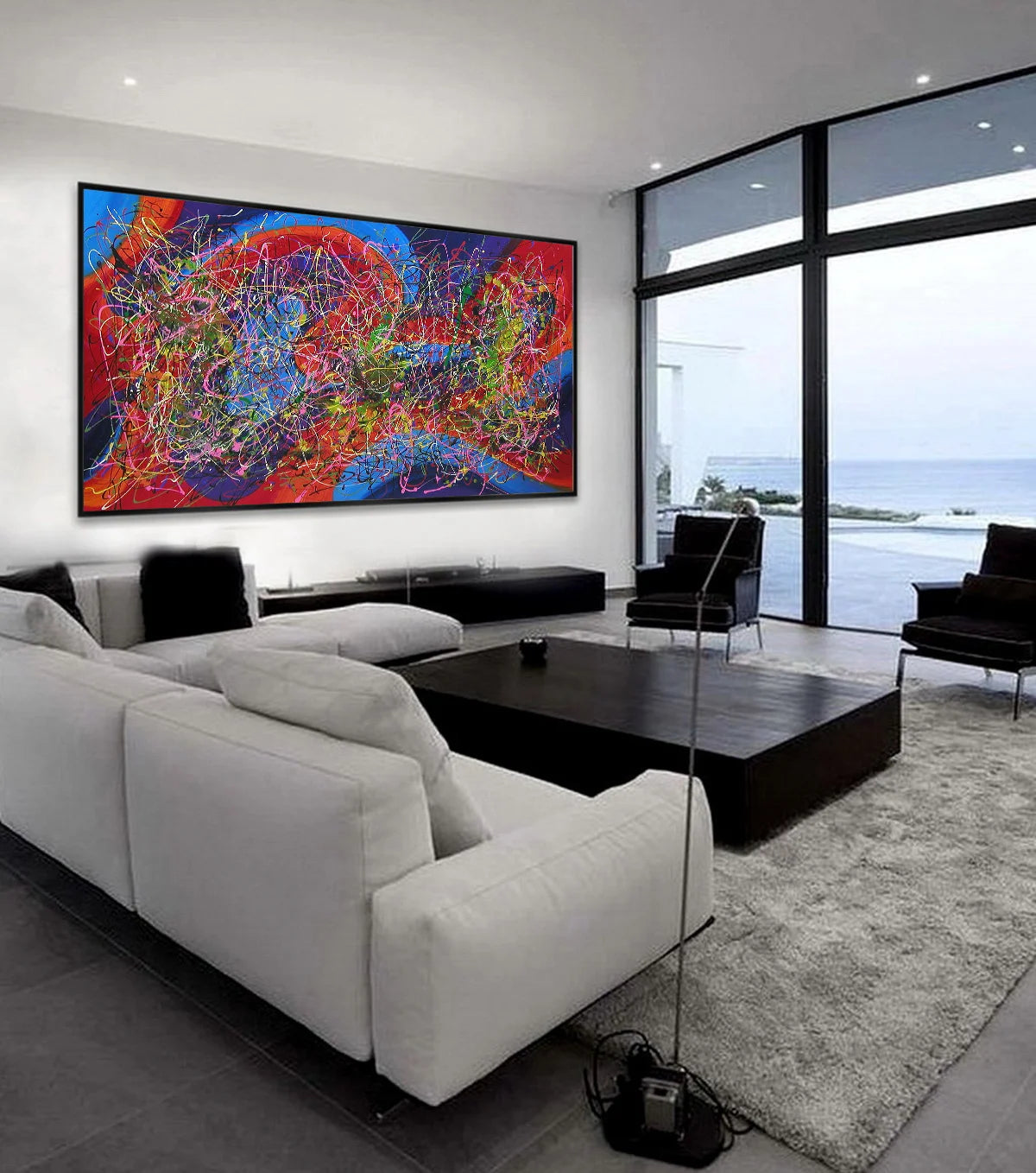 Modern Living Room Paintings – Abstract Wall Art displayed in a contemporary living room setting with ocean view.