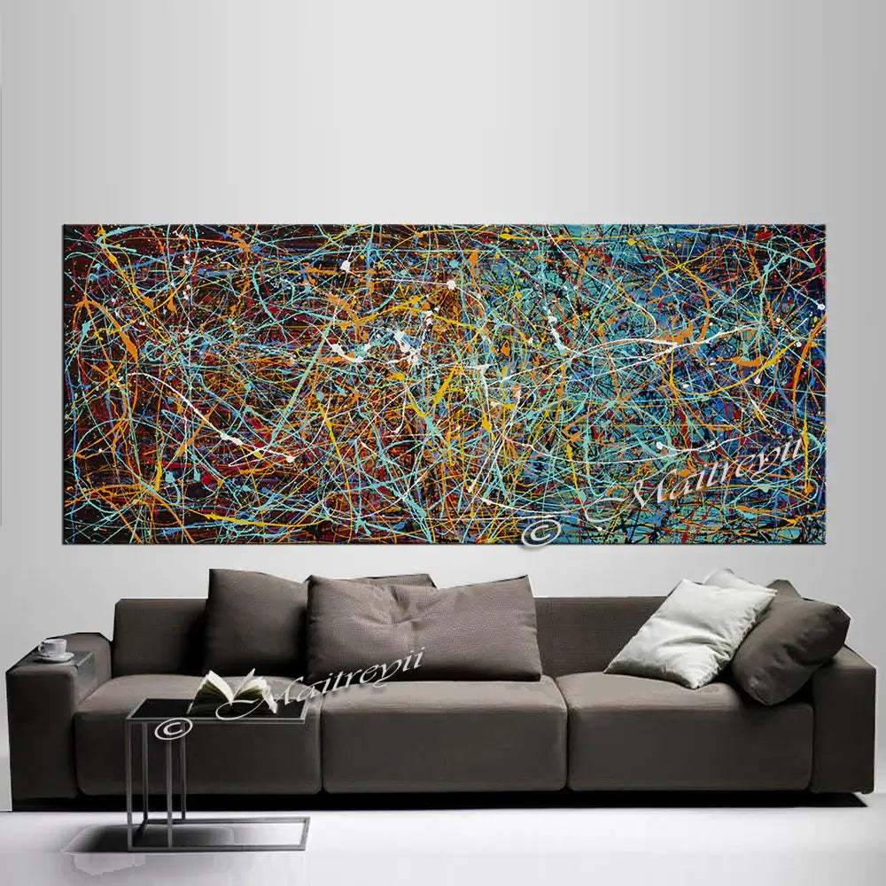 Jackson Pollock Style | Abstract Canvas Art - Vintage Beauty 16 displayed above a stylish gray sofa in a modern living room.