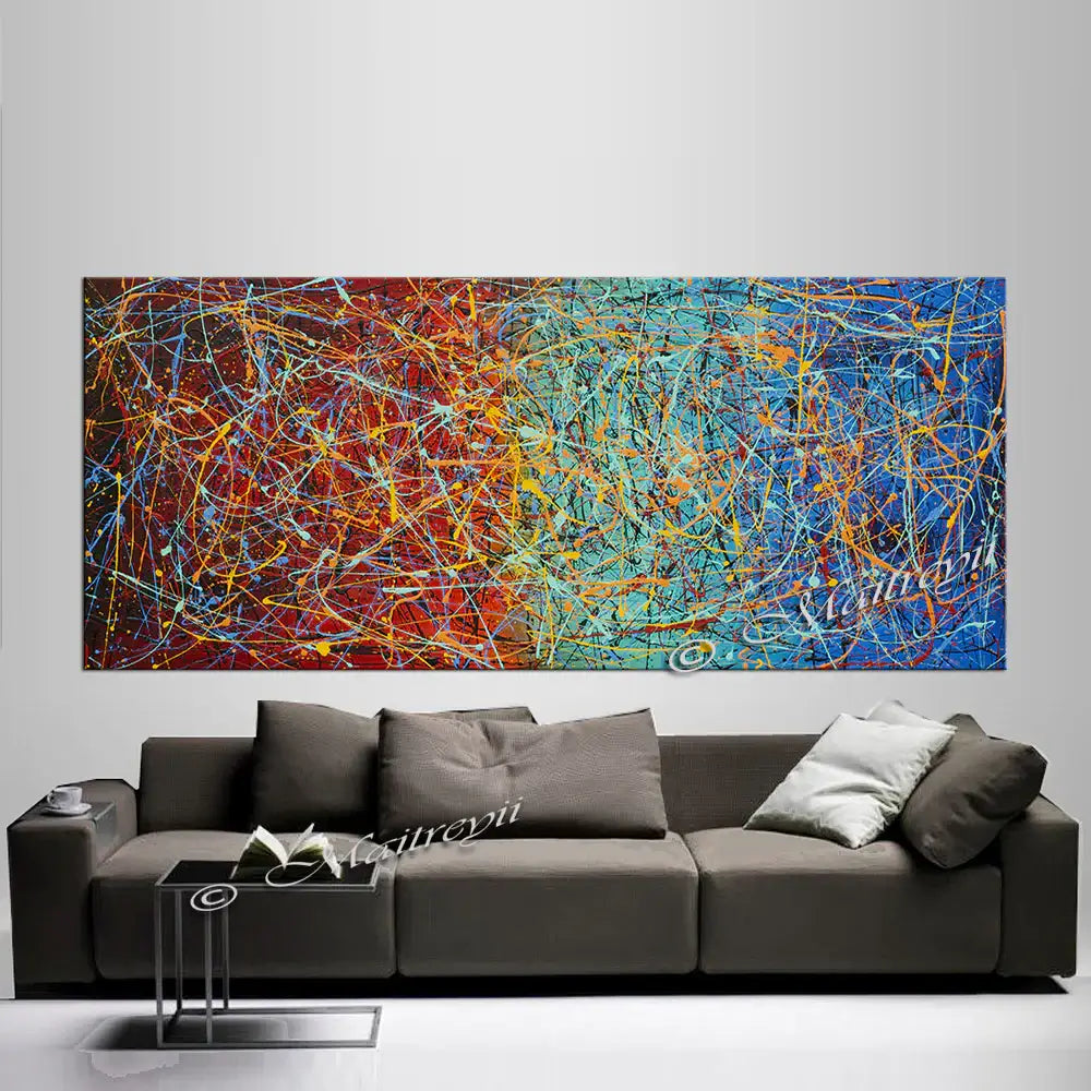 Jackson Pollock Style | Abstract Canvas Wall Art displayed above a modern sofa, showcasing vibrant colors and dynamic textures.