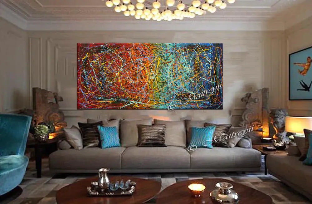 Jackson Pollock Style abstract canvas wall art displayed in a modern living room with blue accents.