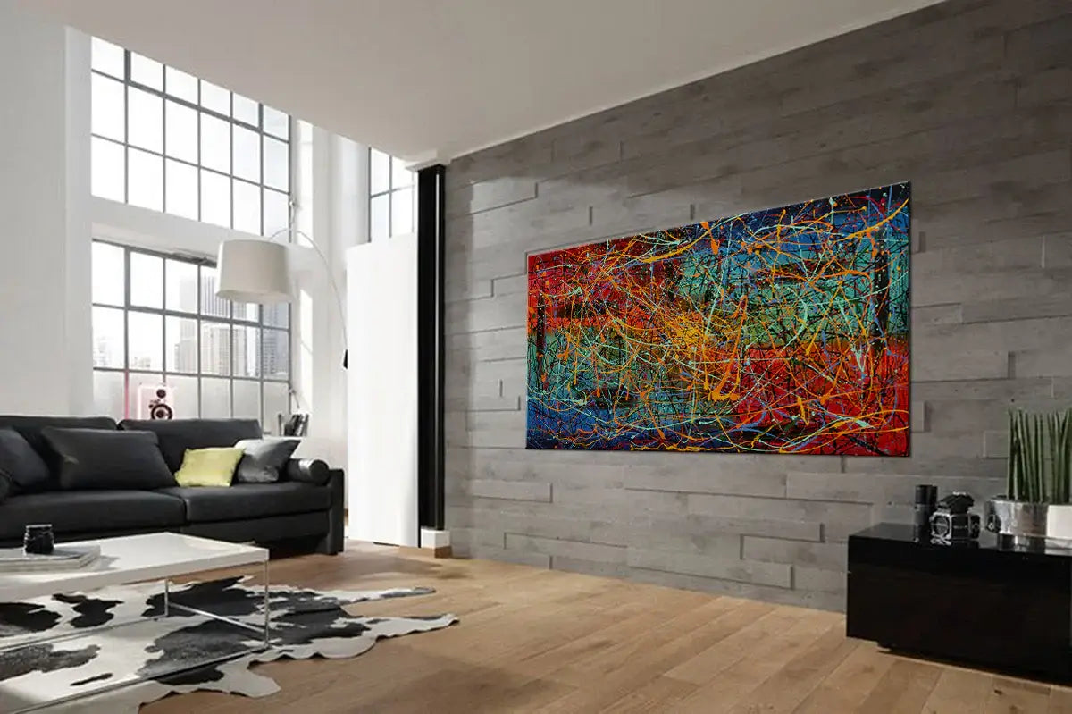 Abstract expressionist painting displayed in a stylish living room with modern decor.