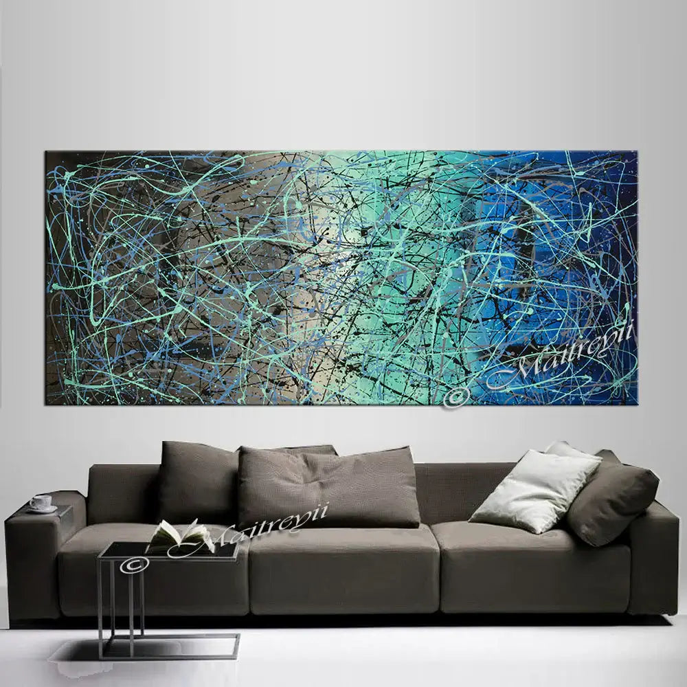 Jackson Pollock Style Painting showcasing dynamic abstract art above a modern sofa in a contemporary interior.