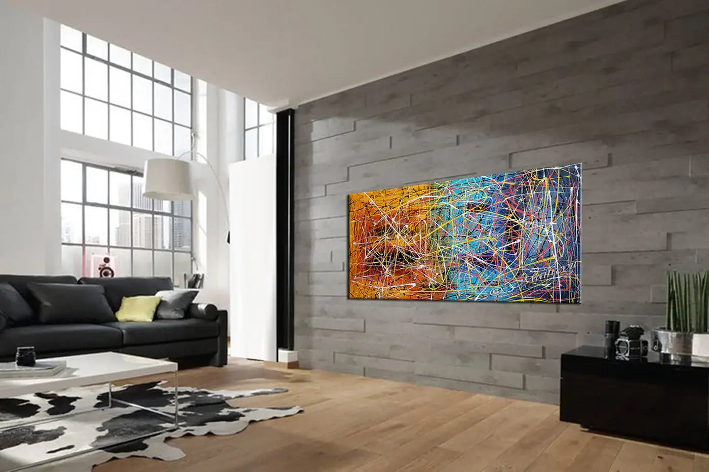 Jackson Pollock Style painting in modern living room, showcasing vibrant colors and dynamic movement in abstract art.