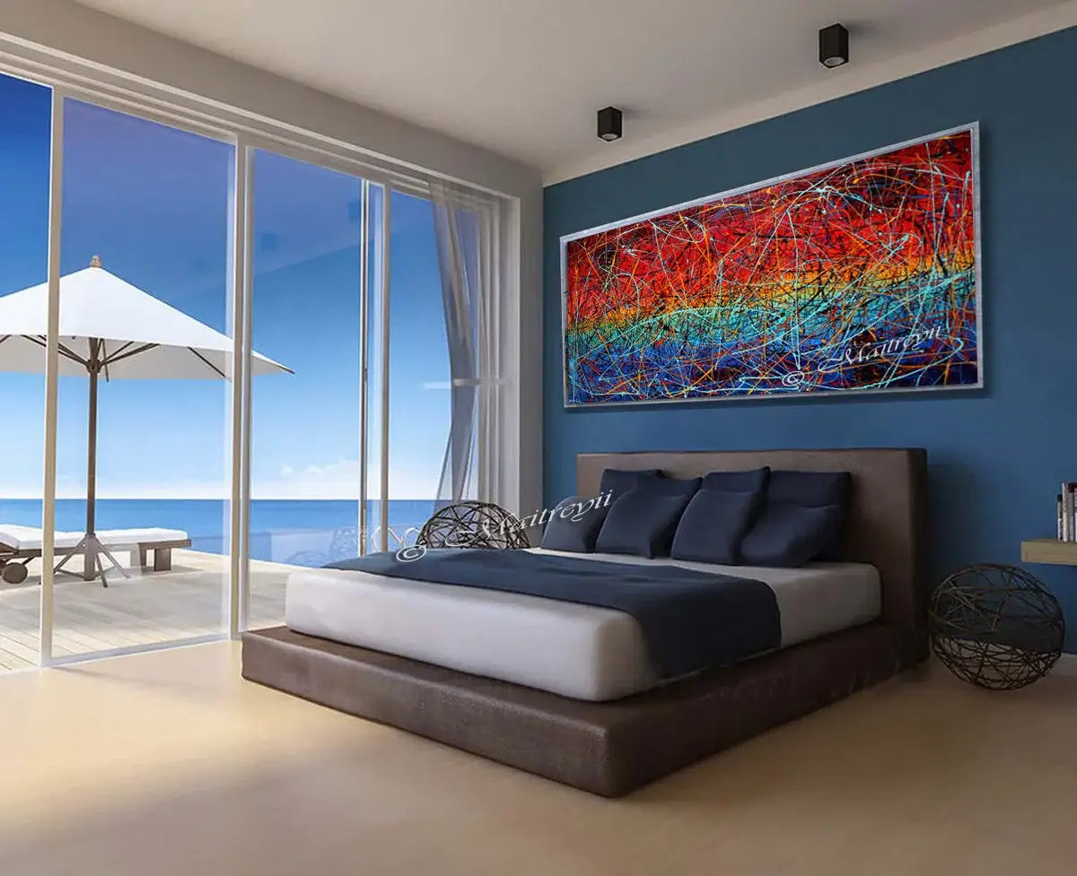 Painting Abstract Art displayed in a modern bedroom with ocean view, showcasing vibrant colors and expressive brushwork.