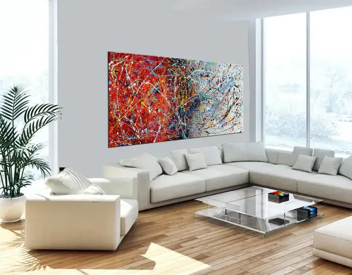 Modern abstract hand-painted canvas wall decor in contemporary living room, showcasing vibrant colors and dynamic textures.