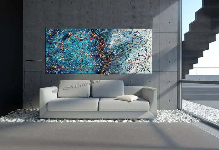 Blue abstract painting on canvas above a modern sofa in a stylish interior, adding artistic beauty to the space.