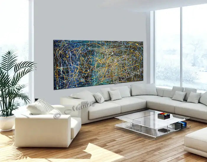 Abstract art displayed in a modern living room, featuring a hand-painted canvas on the wall for stylish wall décor.