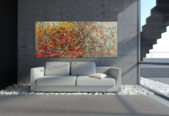 Abstract Art for Living Room displayed above a modern sofa in a stylish living room setting with concrete walls.