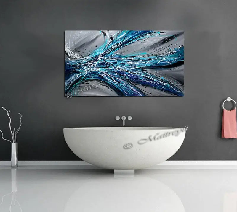 Large Abstract Blue Painting displayed above a modern bathtub, showcasing vibrant blue hues and elegant design.