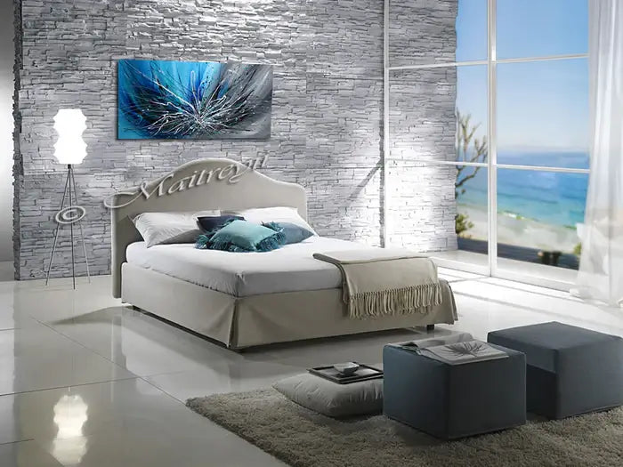 Abstract Art Blue Wall Art in modern bedroom decor with stone wall and ocean view, showcasing winter blossom inspiration.