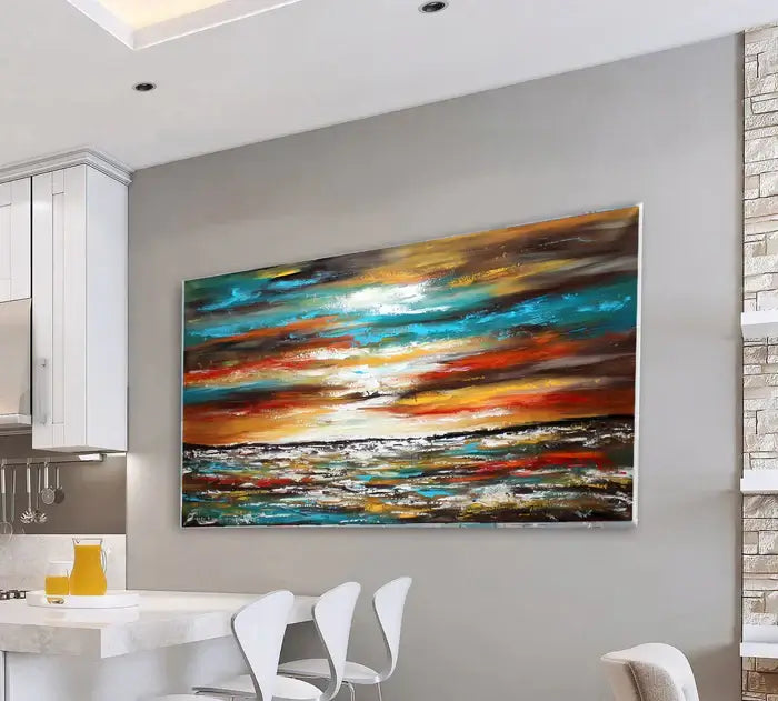 Large ocean art oil painting framed on a modern kitchen wall, showcasing vibrant sea and sunset colors.