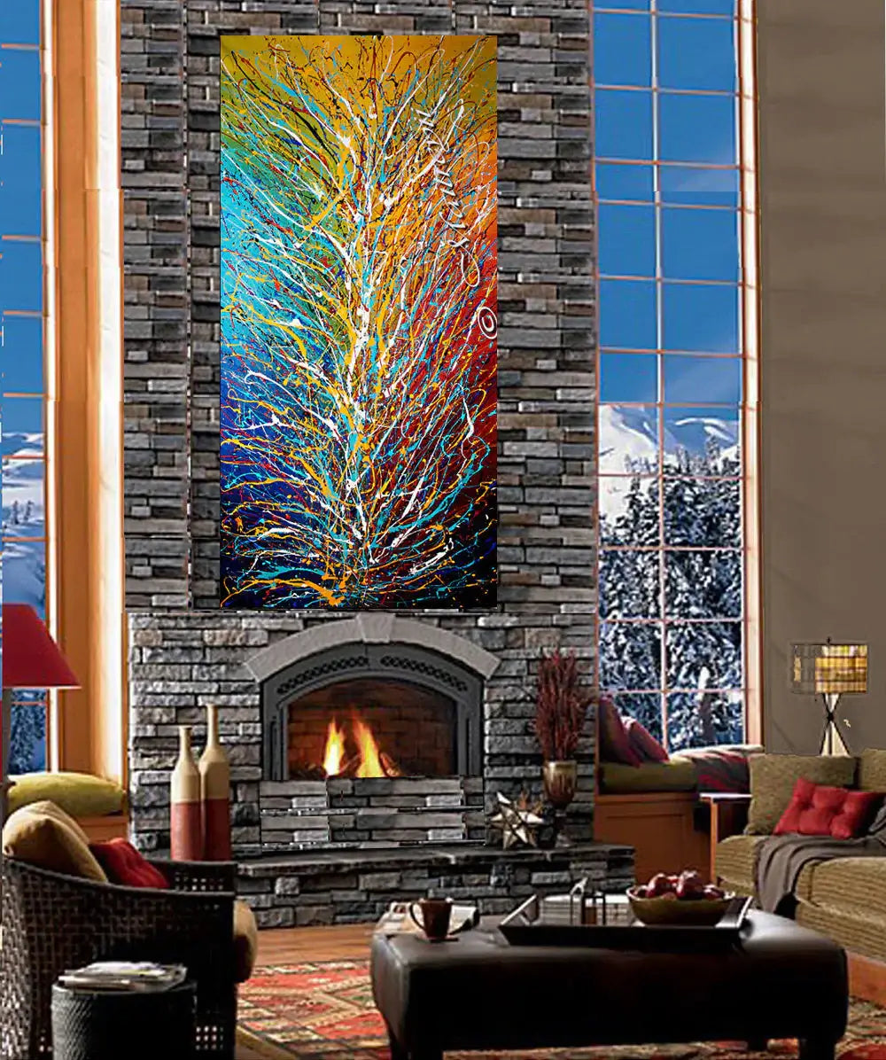 Multicoloured Painting On Canvas displayed in a modern living room with a stone fireplace and large windows.