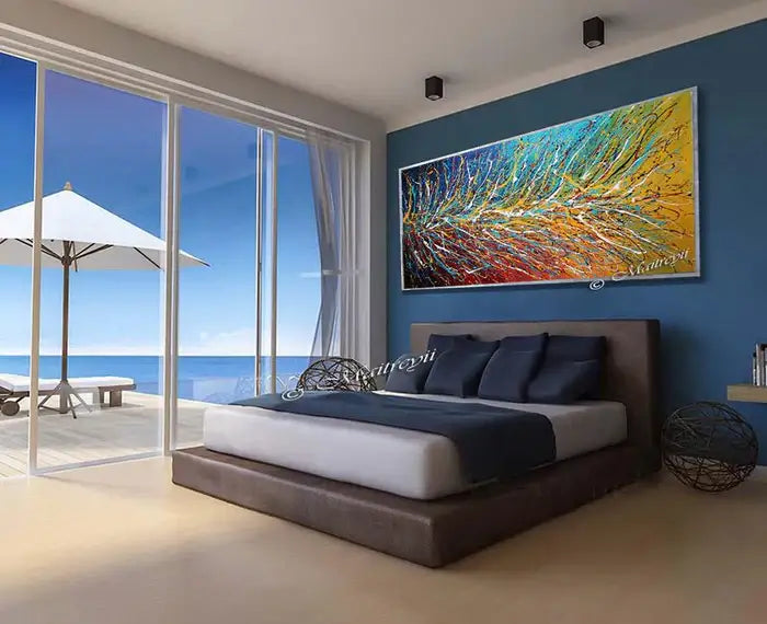 Multicoloured Painting On Canvas displayed above a modern bed in a serene bedroom with ocean view.