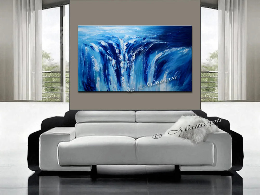 Falls Landscape Wall Art in a modern living room featuring stunning blues resembling Niagara Falls.
