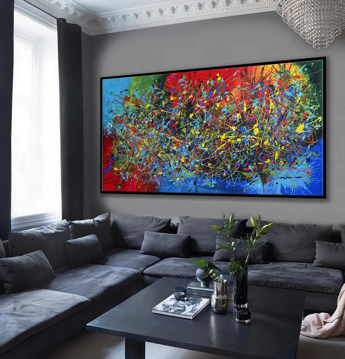 Modern Living Room Paintings – bold abstract drip painting with vibrant colors in a stylish living room decor.