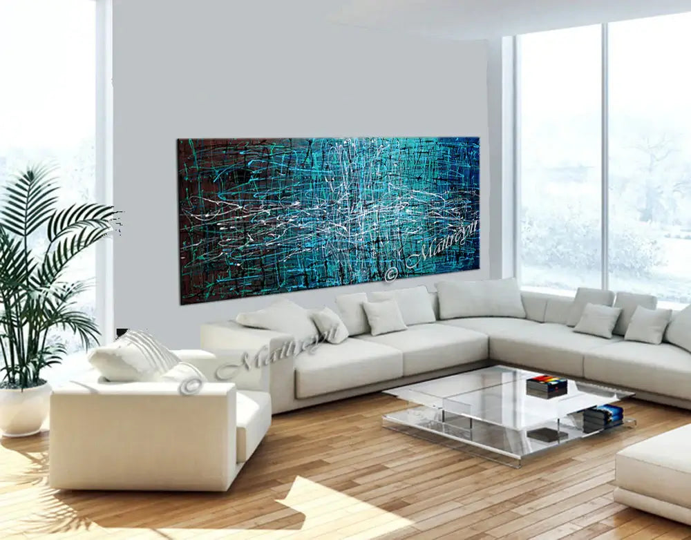 Abstract drip painting displayed in a modern living room with a minimalist design and large windows showcasing natural light.