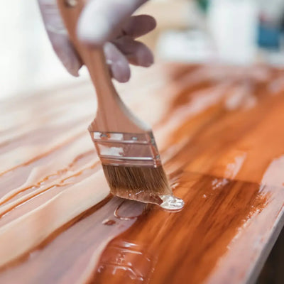 Protective varnish finish for color protection and durability